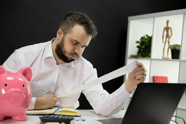 A frustrated business owner dealing with outdated server hardware.