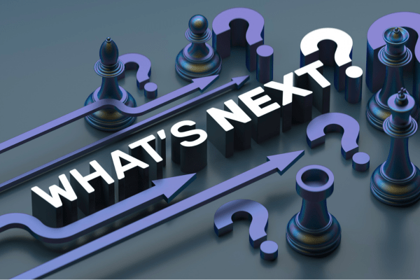 What’s Next After Booking Your Assessment Conceptual image with chess pieces, arrows, and question marks surrounding the phrase ‘What’s Next?’, representing decision-making and next steps after booking a Microsoft Risk Assessment.